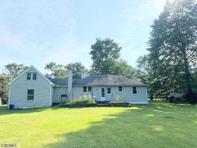 30 Bennington Pkwy, Franklin Twp, NJ 08823 - back of house with a chimney and a yard
