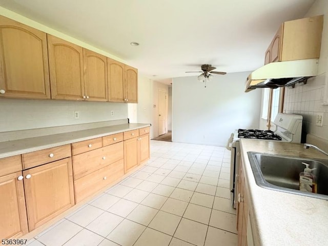 30 Bennington Pkwy, Franklin Twp, NJ 08823 - kitchen featuring white gas range oven, exhaust hood, light countertops, a ceiling fan, and light tile patterned flooring