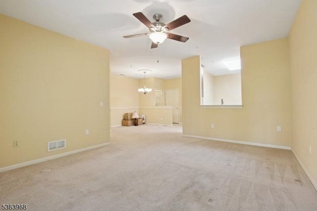 5003 Brookfield Glen Dr, White Twp, NJ 07823 - unfurnished living room with ceiling fan, a chandelier, and carpet flooring