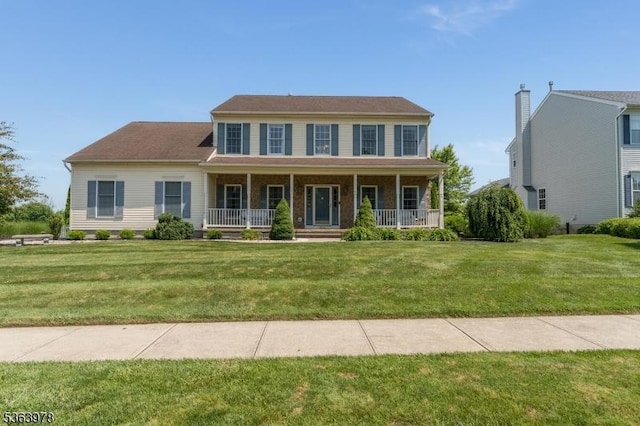 1611 Adams Dr, Greenwich Twp, NJ 08886 - colonial-style house featuring a porch and a front yard