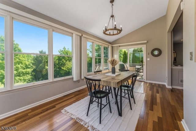 1611 Adams Dr, Greenwich Twp, NJ 08886 - dining area featuring a chandelier, hardwood / wood-style flooring, and vaulted ceiling