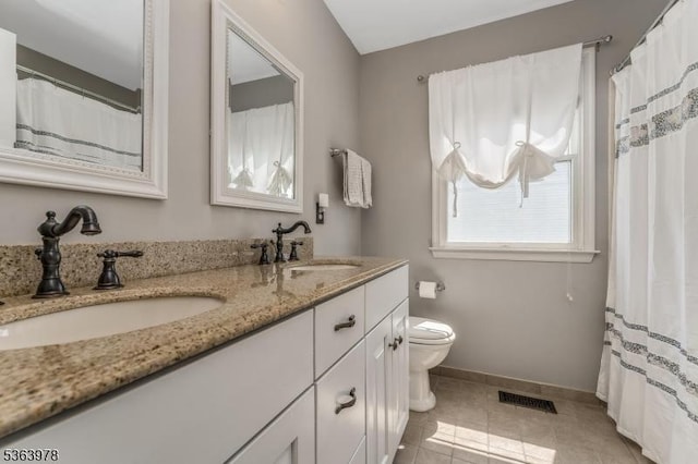 1611 Adams Dr, Greenwich Twp, NJ 08886 - bathroom with double vanity and tile patterned floors