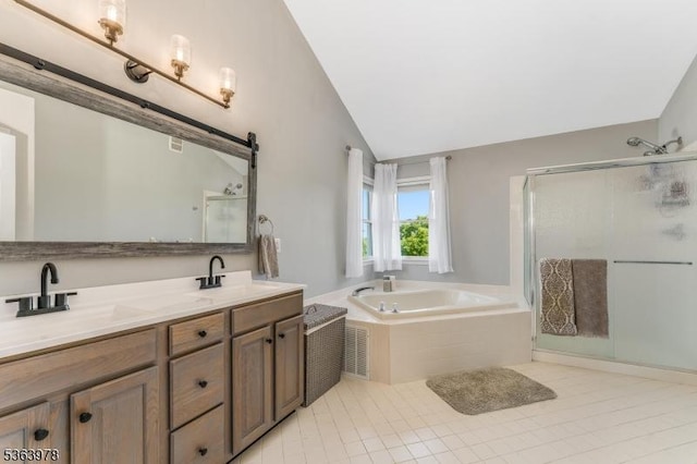 1611 Adams Dr, Greenwich Twp, NJ 08886 - full bath with a garden tub, lofted ceiling, a shower stall, double vanity, and tile patterned flooring