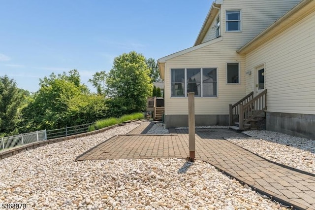 1611 Adams Dr, Greenwich Twp, NJ 08886 - view of side of property with entry steps and a patio