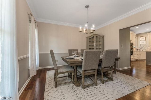 1611 Adams Dr, Greenwich Twp, NJ 08886 - dining space with wood-type flooring, a chandelier, and ornamental molding