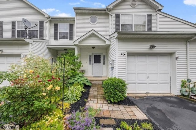 143 Canal Way, Hackettstown Town, NJ 07840 - view of property with asphalt driveway and an attached garage