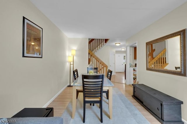 143 Canal Way, Hackettstown Town, NJ 07840 - dining room featuring stairway and light wood-style floors