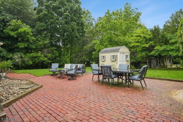 64 Mckinley Ave, West Caldwell Twp, NJ 07006 - view of patio with outdoor dining area and a storage shed