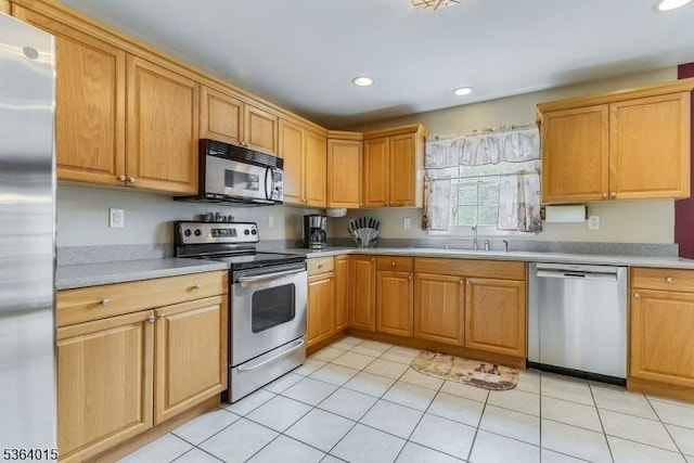 31 Arthur Ave, Andover Twp, NJ 07860 - kitchen with stainless steel appliances, recessed lighting, light countertops, and light tile patterned flooring
