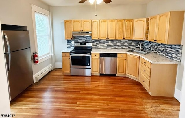 191 Summit Ave, Phillipsburg Town, NJ 08865 - kitchen with appliances with stainless steel finishes, baseboard heating, light brown cabinets, under cabinet range hood, and light wood finished floors