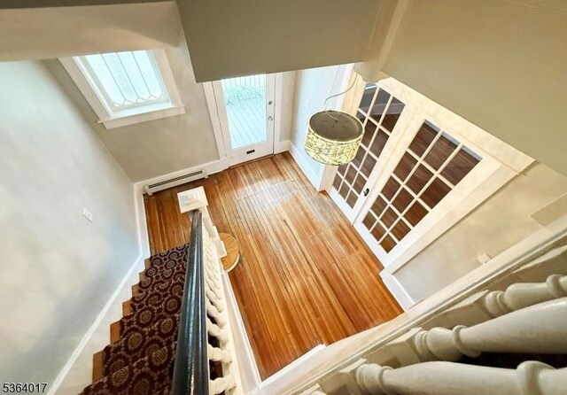191 Summit Ave, Phillipsburg Town, NJ 08865 - staircase featuring a baseboard radiator and wood finished floors