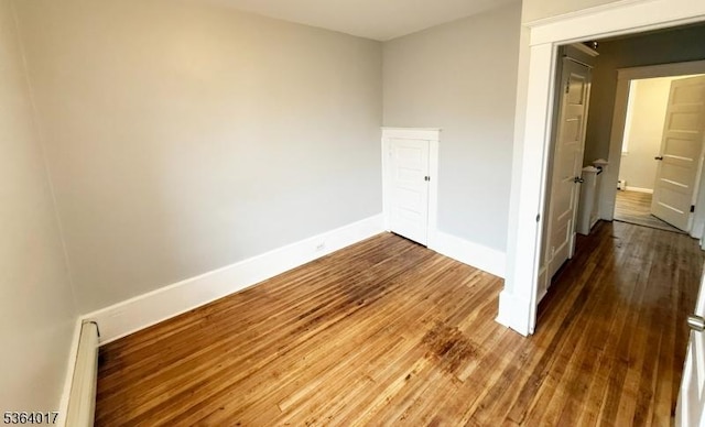 191 Summit Ave, Phillipsburg Town, NJ 08865 - spare room with wood finished floors and a baseboard heating unit