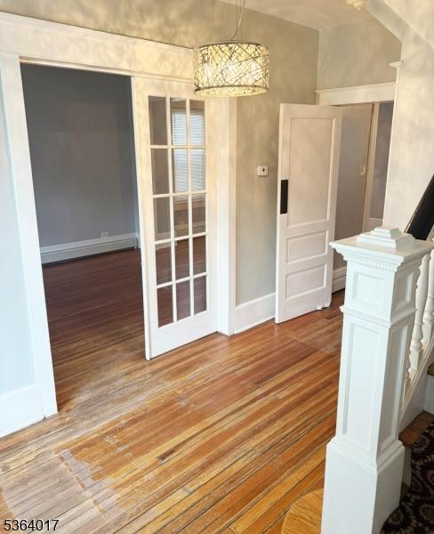 191 Summit Ave, Phillipsburg Town, NJ 08865 - unfurnished room with wood finished floors and baseboard heating