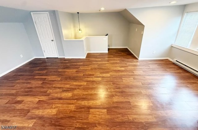 191 Summit Ave, Phillipsburg Town, NJ 08865 - additional living space with dark wood finished floors, a baseboard heating unit, and vaulted ceiling