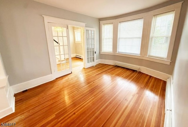 191 Summit Ave, Phillipsburg Town, NJ 08865 - empty room with a baseboard radiator and light wood finished floors