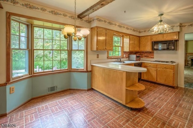 192 Carol Jean Way, Branchburg Twp, NJ 08876 - kitchen featuring a chandelier, black microwave, a peninsula, brick flooring, and light countertops