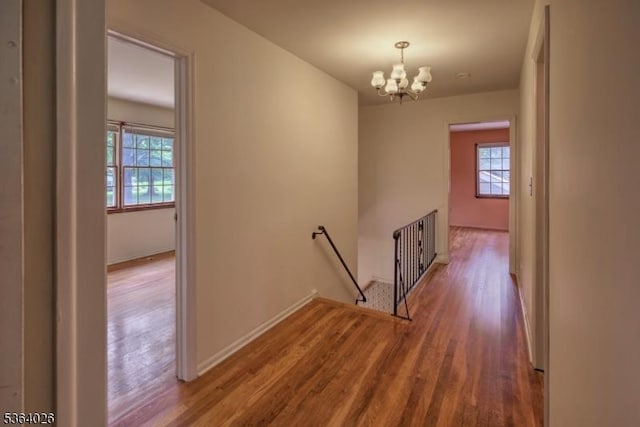 192 Carol Jean Way, Branchburg Twp, NJ 08876 - hall featuring an upstairs landing, a chandelier, and wood finished floors
