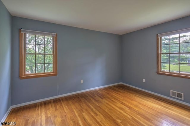 192 Carol Jean Way, Branchburg Twp, NJ 08876 - unfurnished room with healthy amount of natural light and light wood-style floors