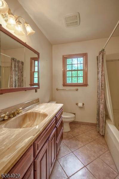 192 Carol Jean Way, Branchburg Twp, NJ 08876 - full bathroom with vanity, tile patterned flooring, and shower / bath combo