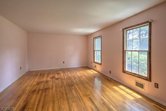 192 Carol Jean Way, Branchburg Twp, NJ 08876 - spare room with light wood-style flooring and baseboards