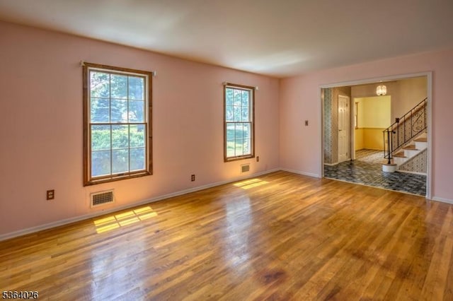192 Carol Jean Way, Branchburg Twp, NJ 08876 - spare room featuring wood finished floors and stairway