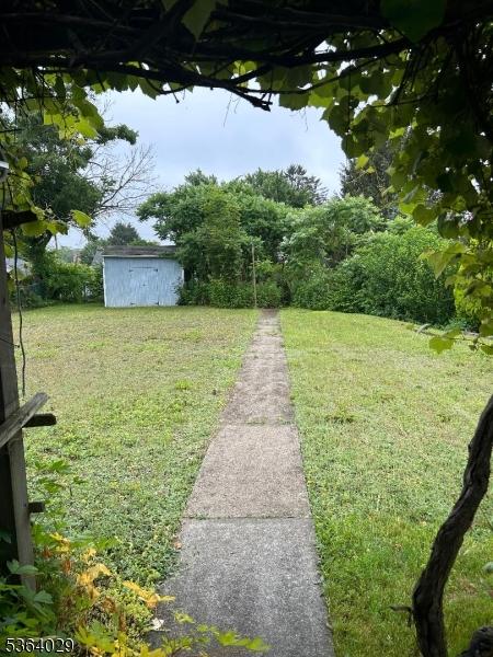 13 N St, Netcong Boro, NJ 07857 - view of green lawn featuring a storage shed