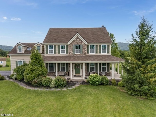 13 Highlands Way, Lopatcong Twp, NJ 08865 - colonial home with a front lawn, covered porch, a shingled roof, and stone siding