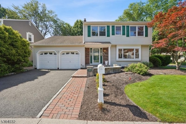 129 Jockey Hollow Way, Union Twp, NJ 07083 - colonial home featuring a garage and driveway
