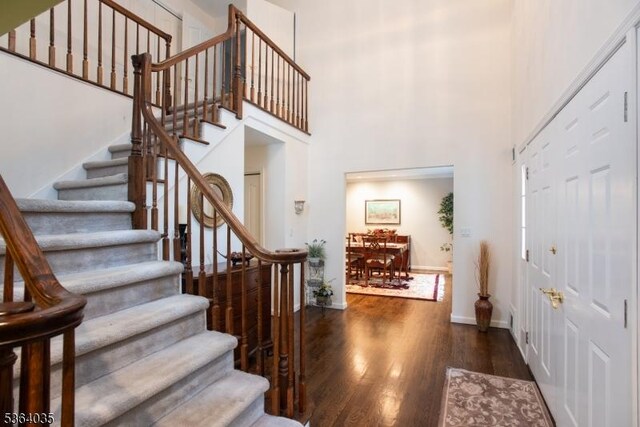 13 Deer Path Cir, Green Brook Twp, NJ 08812 - foyer with stairway, wood finished floors, and a towering ceiling