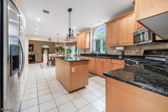 31 Deer Path, Hillsborough Twp, NJ 08844 - kitchen featuring stainless steel appliances, a center island, tasteful backsplash, light tile patterned floors, and recessed lighting