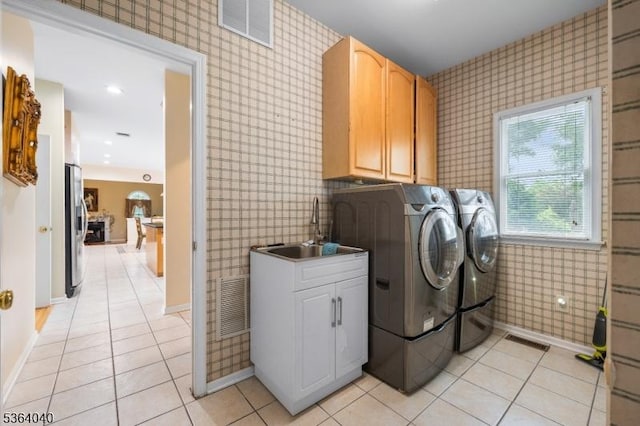 31 Deer Path, Hillsborough Twp, NJ 08844 - washroom featuring washer and dryer, cabinet space, and light tile patterned floors