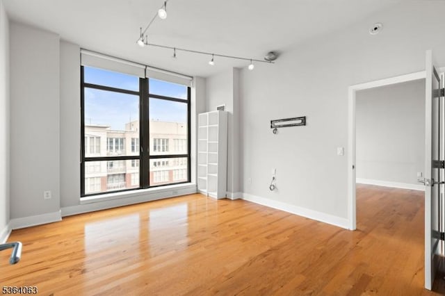 1025 Maxwell Ln Unit 1209, Hoboken City, NJ 07030 - unfurnished room featuring wood finished floors and baseboards