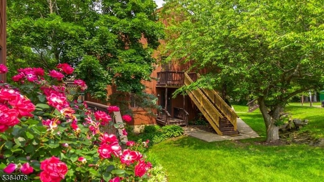 2 Falkenstein Dr Unit 10, Vernon Twp, NJ 07462 - view of jungle gym with stairs, a yard, and a wooden deck