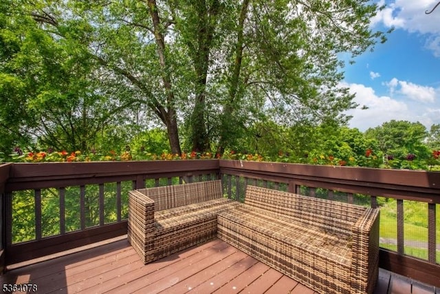 2 Falkenstein Dr Unit 10, Vernon Twp, NJ 07462 - wooden deck with an outdoor hangout area