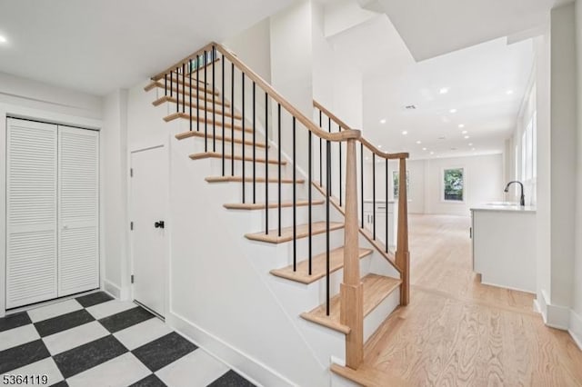 24 Tuers Pl, Montclair Twp, NJ 07043 - stairs featuring recessed lighting and tile patterned floors