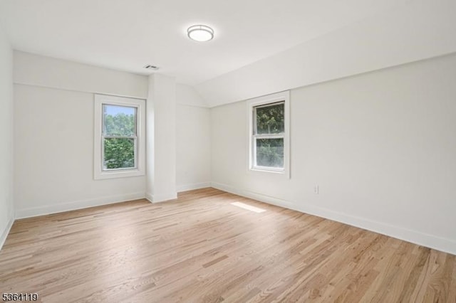 24 Tuers Pl, Montclair Twp, NJ 07043 - unfurnished room featuring lofted ceiling and light wood-type flooring