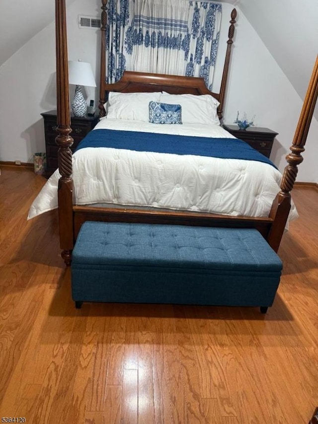 1221 Grant Ave, Plainfield City, NJ 07060 - bedroom with vaulted ceiling and wood finished floors