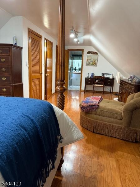 1221 Grant Ave, Plainfield City, NJ 07060 - bedroom with lofted ceiling and wood finished floors