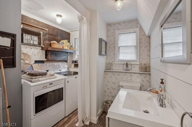 198 Pittsford Way, New Providence Boro, NJ 07974 - bathroom with washer and dryer, vanity, and wood finished floors