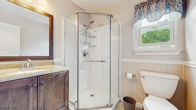 505 Sheppard Ct, Hillsborough Twp, NJ 08844 - bathroom featuring a wainscoted wall, a stall shower, and vanity