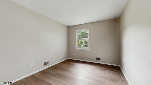 505 Sheppard Ct, Hillsborough Twp, NJ 08844 - spare room with wood finished floors and baseboards