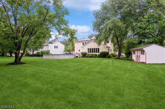 505 Sheppard Ct, Hillsborough Twp, NJ 08844 - view of green lawn featuring a storage shed and an outdoor pool
