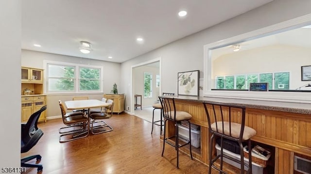 505 Sheppard Ct, Hillsborough Twp, NJ 08844 - dining room featuring wood finished floors, recessed lighting, and a bar