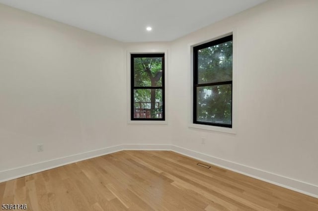 21 W Cliff St, Somerville Boro, NJ 08876 - empty room with light wood finished floors and recessed lighting