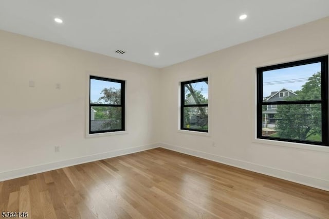 21 W Cliff St, Somerville Boro, NJ 08876 - empty room with light wood finished floors and recessed lighting