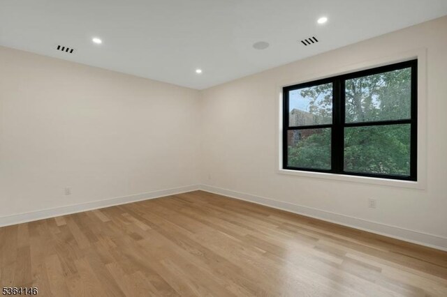 21 W Cliff St, Somerville Boro, NJ 08876 - empty room with light wood-style floors and recessed lighting