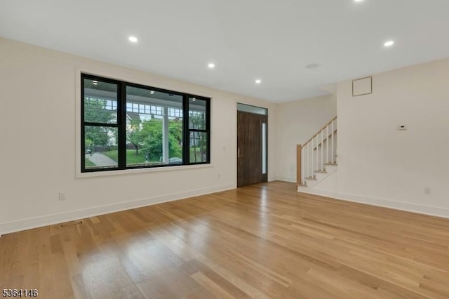 21 W Cliff St, Somerville Boro, NJ 08876 - unfurnished room with light wood-style flooring, stairway, and recessed lighting