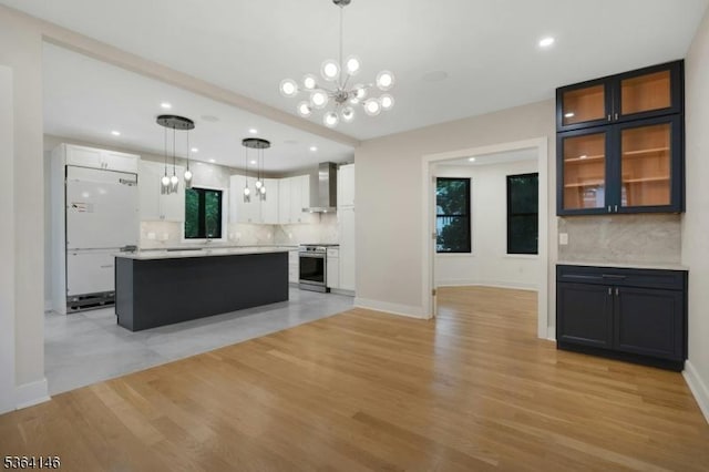 21 W Cliff St, Somerville Boro, NJ 08876 - kitchen featuring wall chimney exhaust hood, decorative backsplash, light countertops, white cabinetry, and recessed lighting