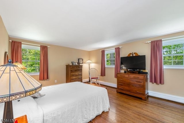 37 Dogwood Dr, Chester Twp, NJ 07930 - bedroom with wood finished floors and a baseboard heating unit