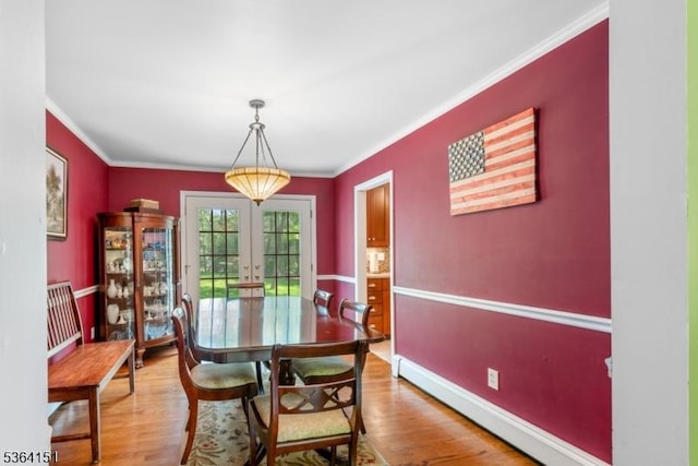 37 Dogwood Dr, Chester Twp, NJ 07930 - dining room with french doors, light wood finished floors, ornamental molding, and baseboard heating